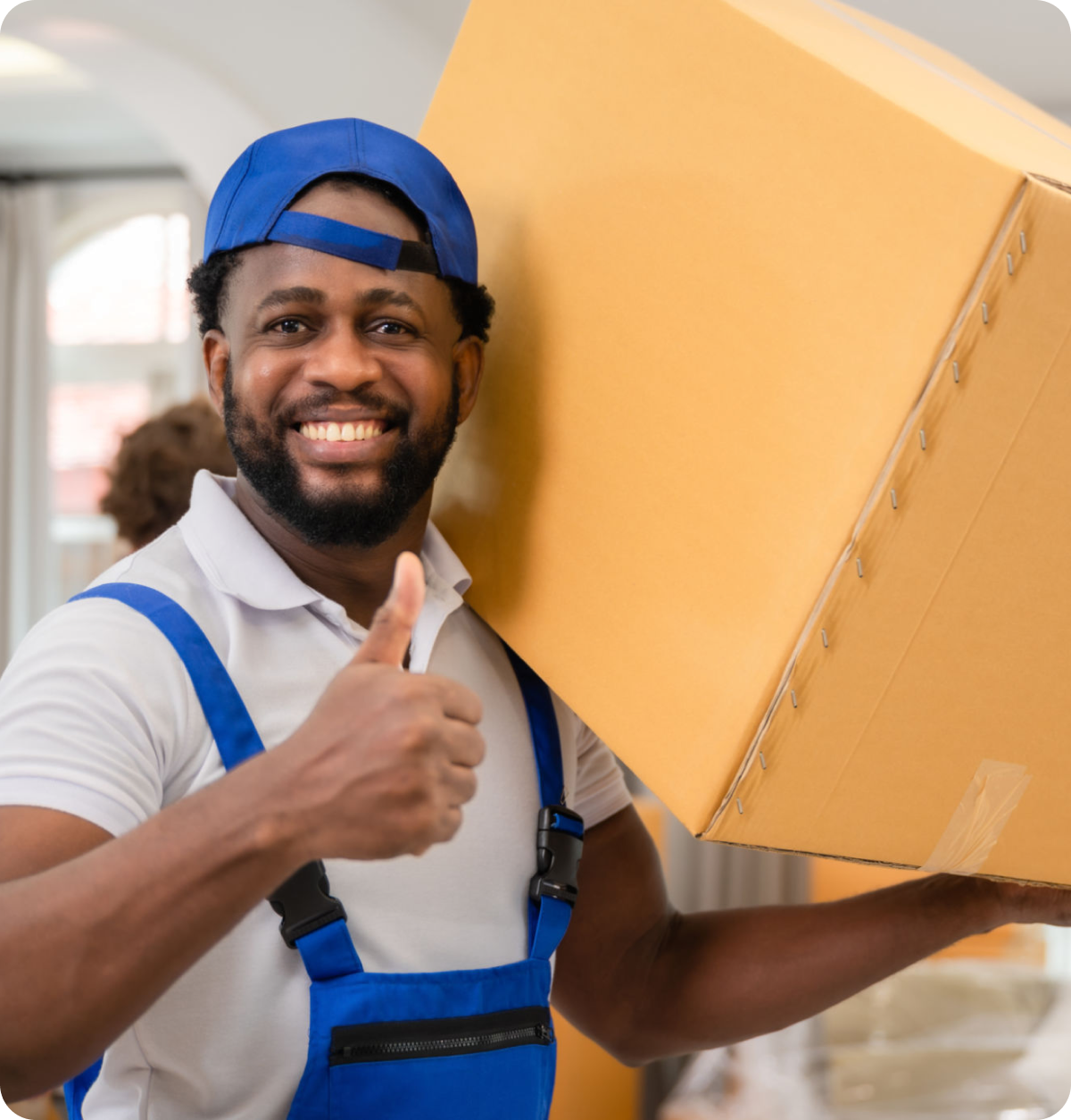 Happy worker holding cardboard box